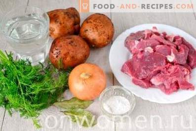 Carne cozida com batatas em um fogão lento